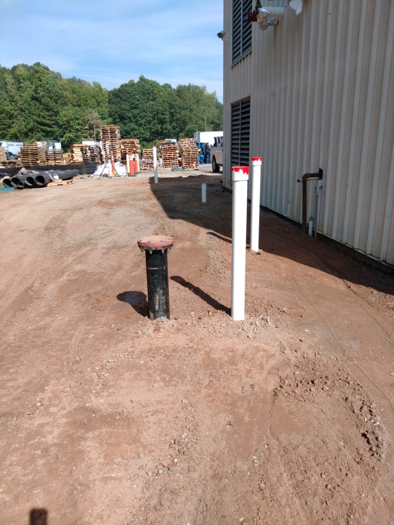 Industrial backfilled after fire riser and sewer install