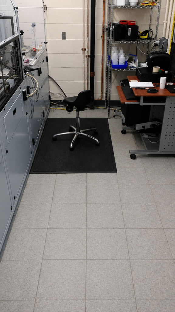 Installation of SDT Static Dissipative Tile Flooring in industrial lab weigh room