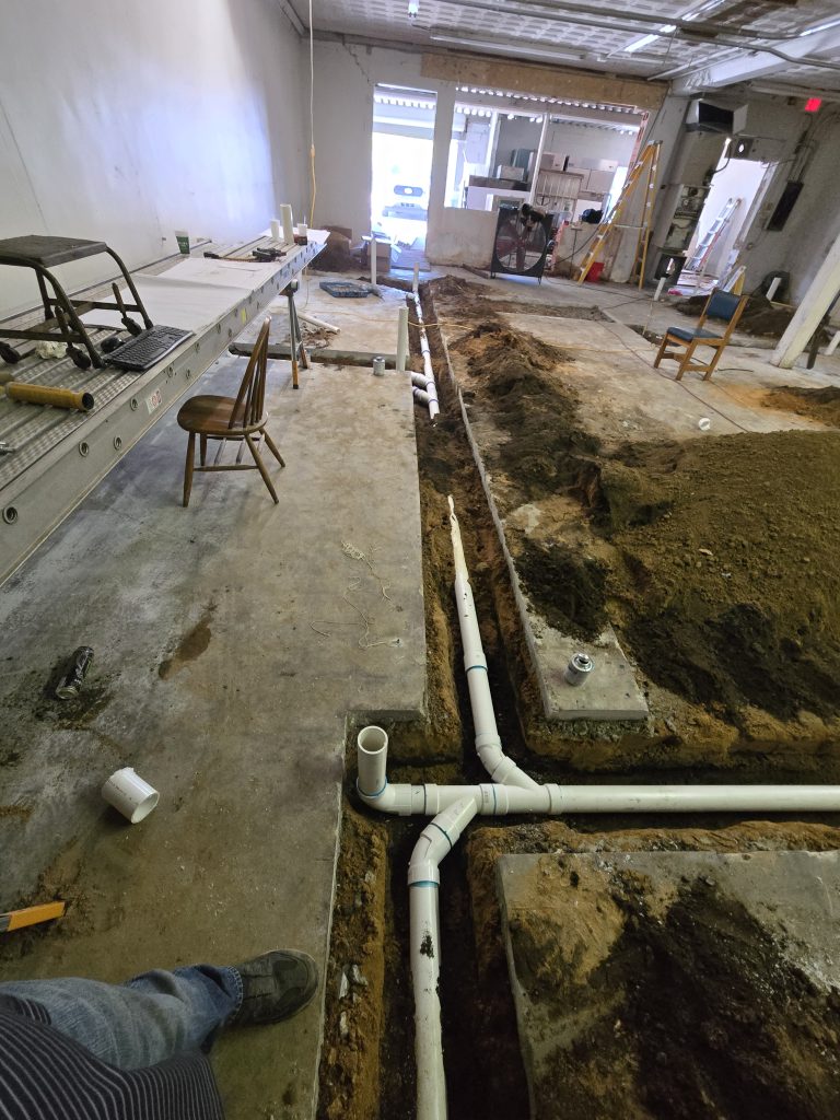 Turn into Restaurant with cutting out concrete and installing plumbing